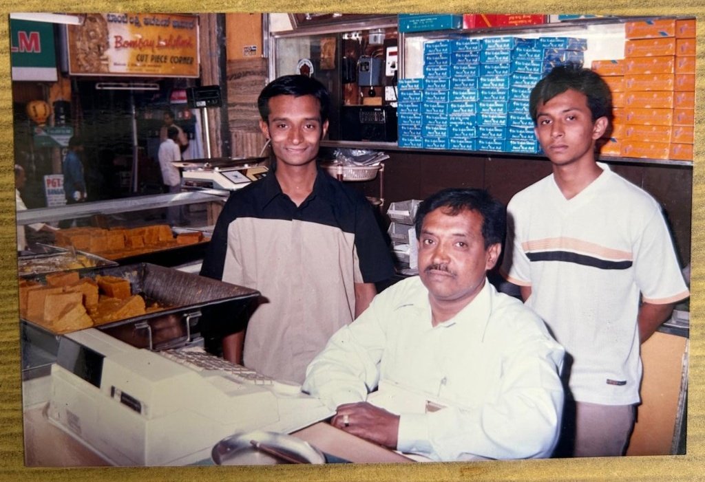 V Nagaraj with grandsons N Raghu and N Srinath at Sri Venkateshwara Sweetmeat Stall Balepet